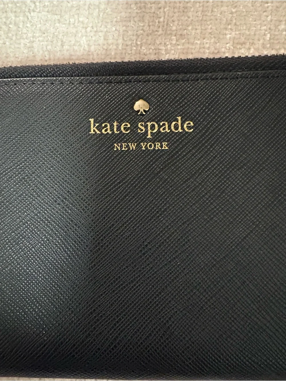 kate spade Black Zip-Around Wallet with Gold Logo